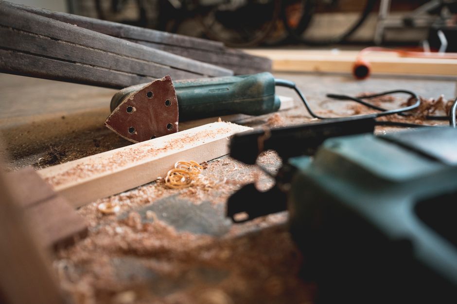 Close up of woodworking tools and raw timber